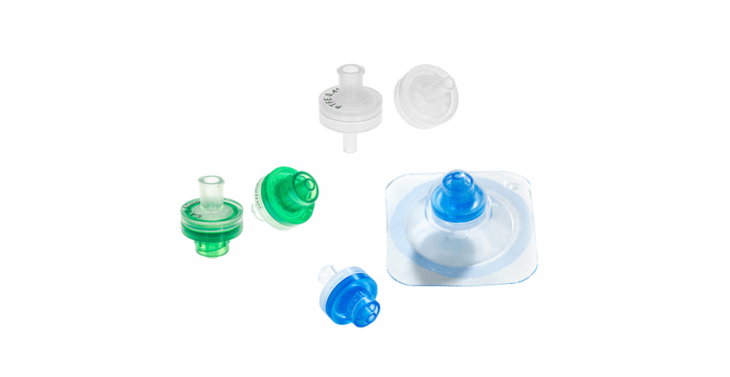 Various syringe filters in green and blue on a white background.