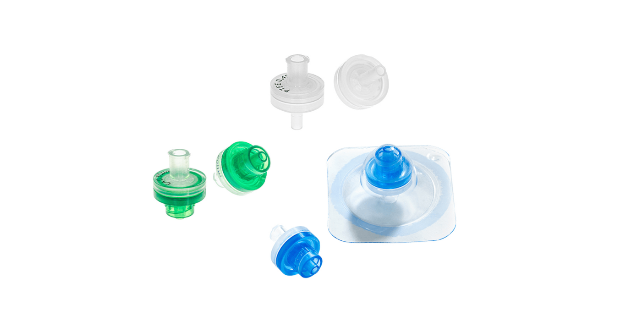 Various syringe filters in green and blue on a white background.