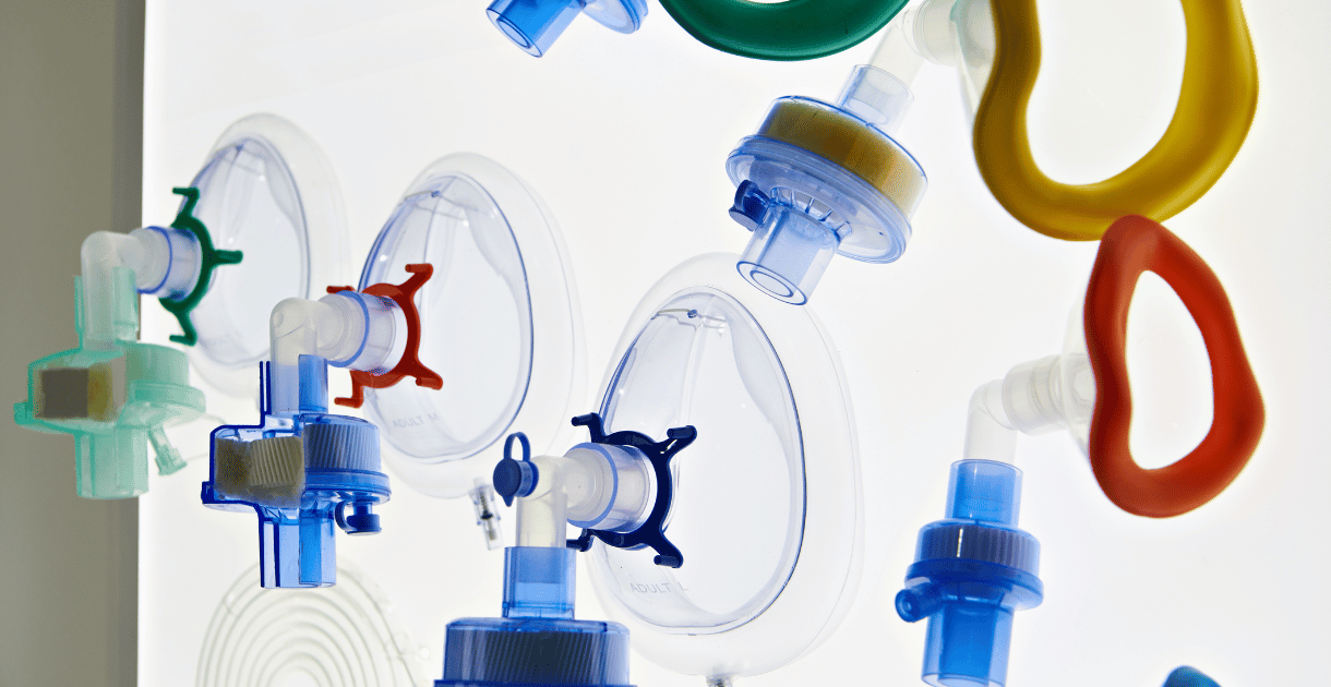 Various respirator masks and filters displayed on a white background.